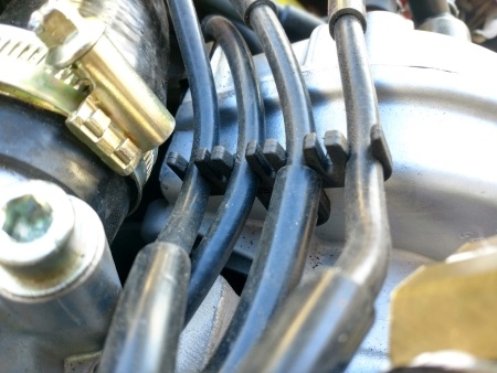 944 spark plug wire loom in place on engine